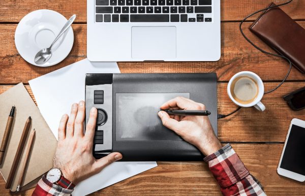 graphic-designer-working-with-interactive-pen-display-digital-drawing-tablet-and-computer.jpg